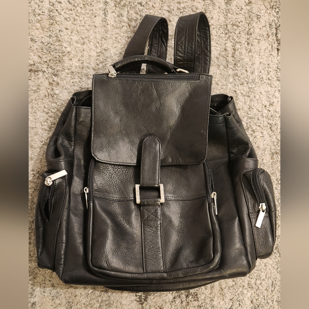 Vintage leather backpack in black color. Made in Colombia